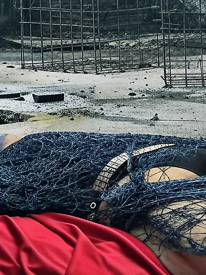 Black Superhero captured in netting.  KO and fondle