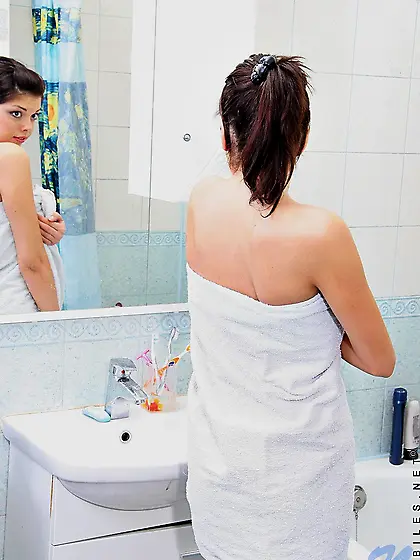 Naked brunette teen Macy Nubiles spends time posing and toying h