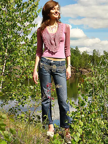 Girl pulling off her jeans