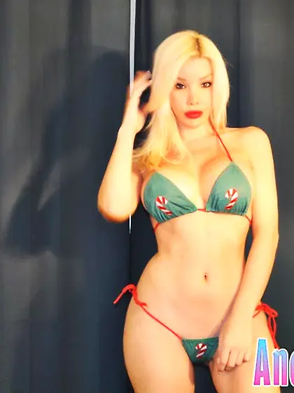 TS strips out of her tiny bikini to show firm ass