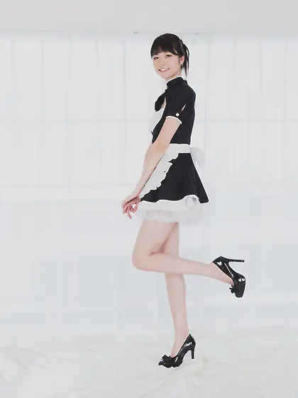 Asian maid with sexy legs and a firm ass is here to tease