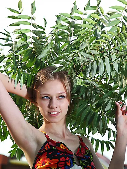 Gorgeous blonde teen Katy D gives a seductive outdoor striptease