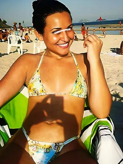 Slut Thays wearing micro bikini at public beach