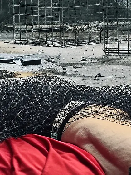 Black Superhero captured in netting.  KO and fondle