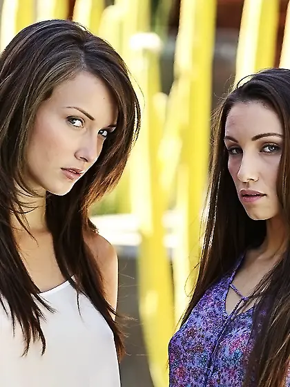 Celeste Star and Malena Morgan strip together on the couch and h