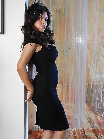 Yurizan Beltran stroking her sexy body while posing in her eroti