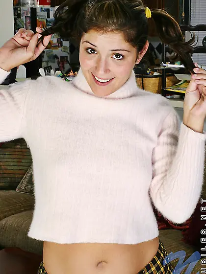 Naughty brunette Bailey Nubiles with funny ponytails lifts her p