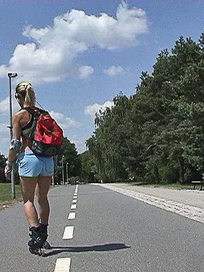 Ponytailed blonde jogger takes