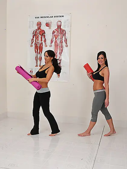 Seductive brunettes exercises gym