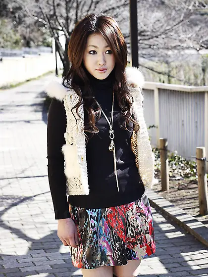 Frisky Asian girl Yu Yamashita in short skirt seductively poses