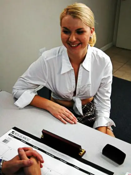 Brunet professor wearing black