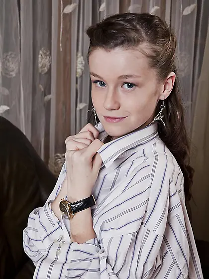 Teen hottie Emily Bloom shows her posing skills in front of the