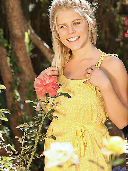 Shaved blonde girl Charlie Lynn in nice yellow dress plays with