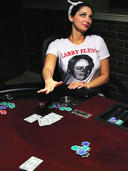 Beautiful brunette babe Bailey Knox is playing poker and proceed