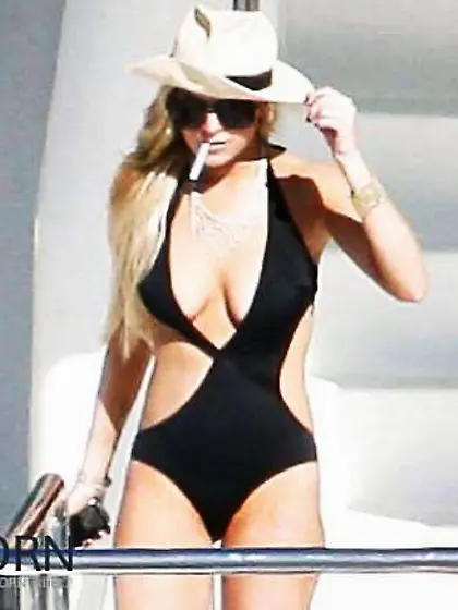 Lindsay Lohan... In Taut Ebony Bathing Suit