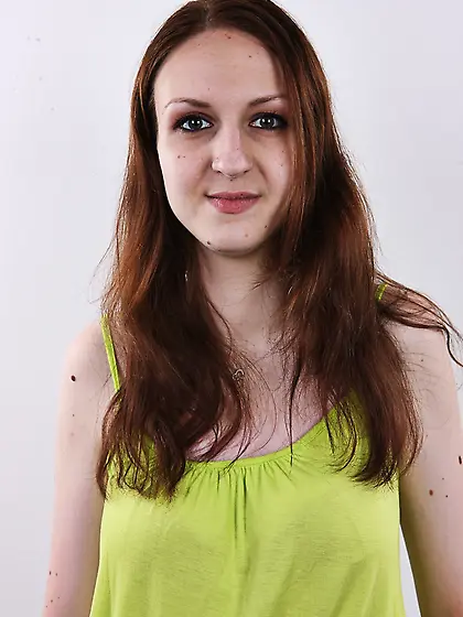 Amateur girl wears green top and blue jeans but finally takes al