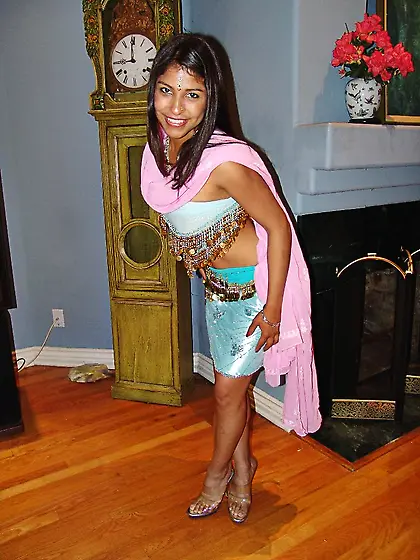 Beautiful indian mehla sits