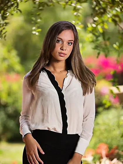 Young gal undresses to reveal small tits and and plays with her