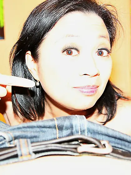 Lustful Asian milf Lucky Starr is sliding her tongue up and down