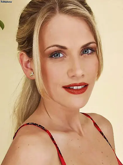 Hot babe with small tits teasing her pink slit with a gold dildo