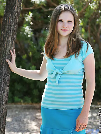 Awesome young brunette is demonstrating great solo skills outdoo