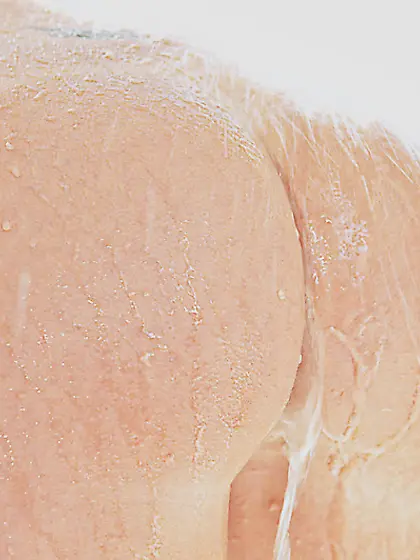 Attractive blonde babe Erica Fontes strips her clothes outdoors