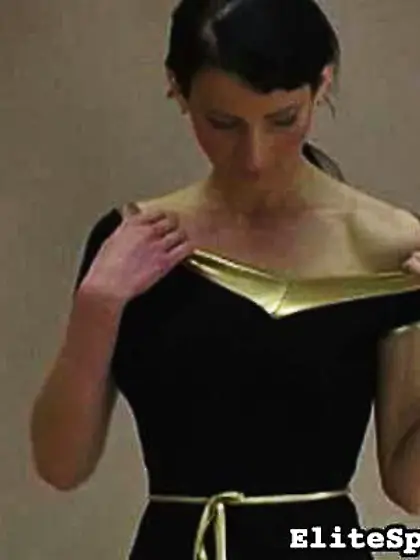 Towheaded dominatrix spanks raven-haired