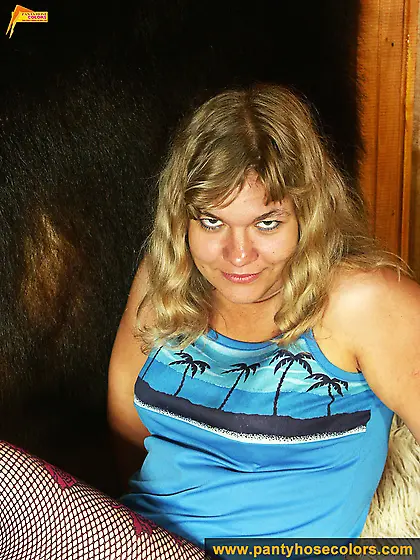 blonde in purple fishnet pantyhose