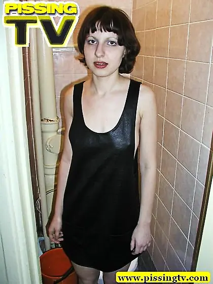 Girl in dress pissing