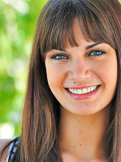 Brown haired beauty Cory FTV in short black skirt flashes her pu