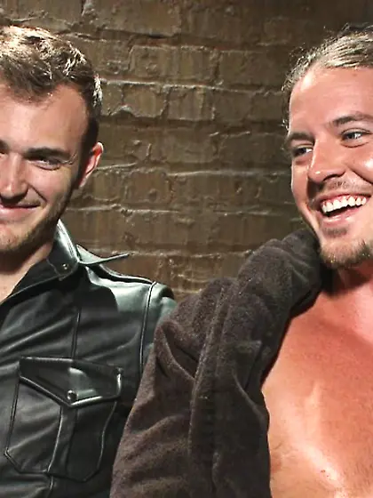 Tattooed bondage master leather