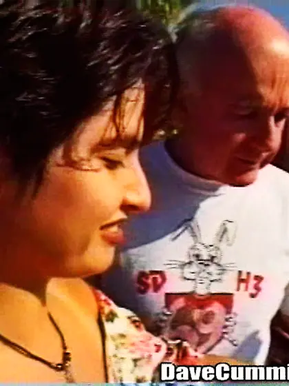 Short-haired brunette floral dress