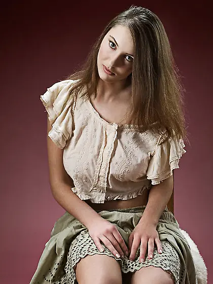 Cute teen with big knockers seductively undresses and shows her