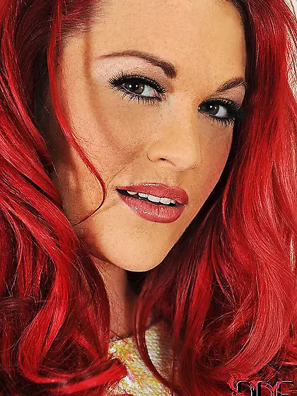 Paige DDF is a busty redhead honey who loves to wear lingerie an