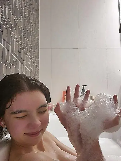 Cute teen enjoying in bath