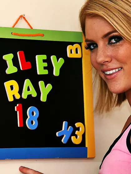 Hot blonde gal Riley Ray strips her pink panties and shows her t