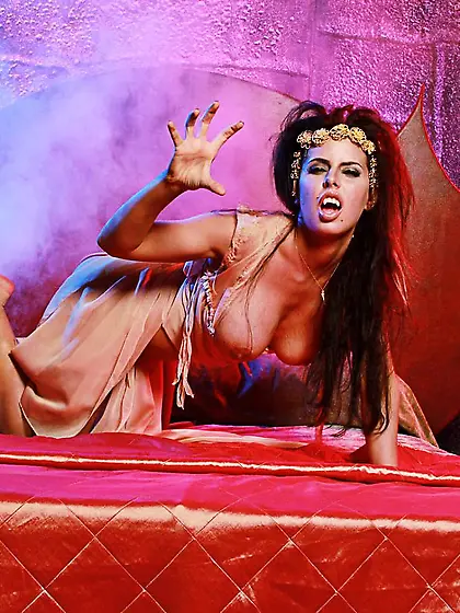 Ancient blonde beauty Bridgette B shows off her big boobs and ha