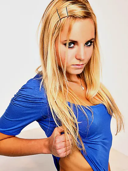 Blond-haired teen in red panties and her shameless posing sessio