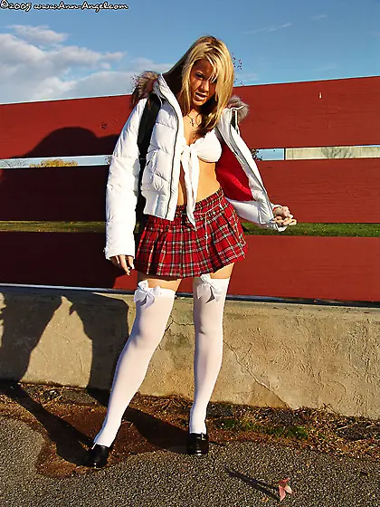 Spicy schoolgirl Ann Angel skips classes and goes to the playgro