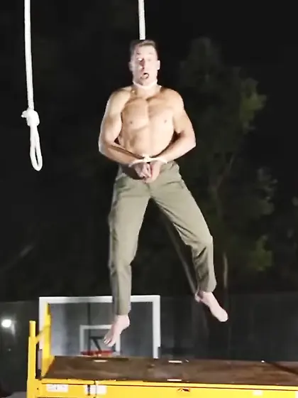 Shirtless hanging