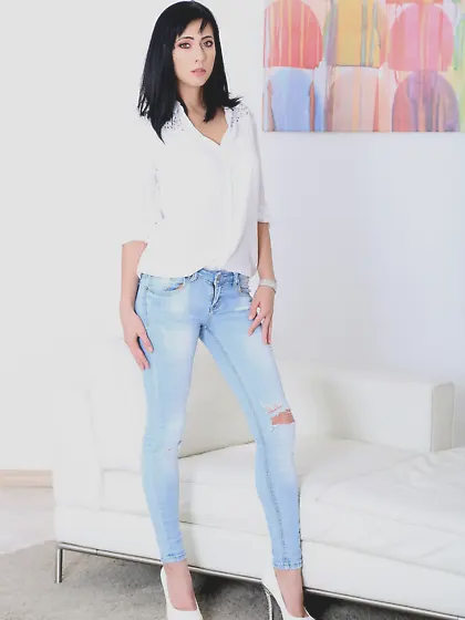 Black-haired bombshell with natural boobs screwed in the living