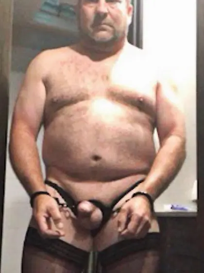 Brandon Hegsted wearing thigh highs and panties