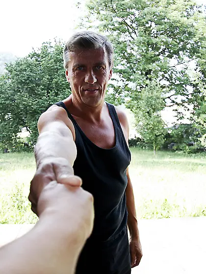 Senior mechanic checks big