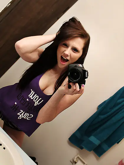 Ravishing brunette girl Freckles strips in front of the mirror a