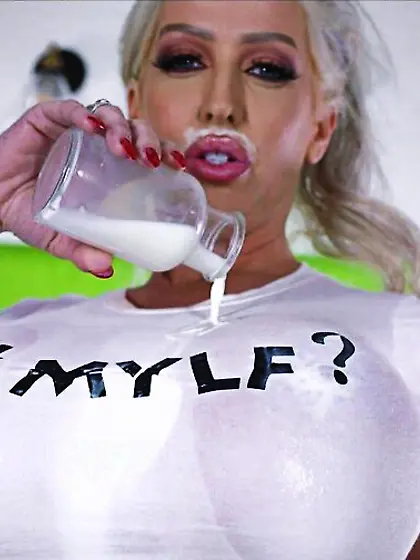 Hot amateur juices her huge boobs with milk