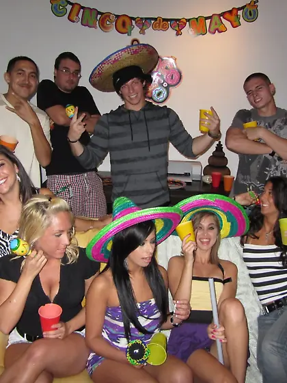 Party girls getting savagely pounded on a big yellow couch,  what