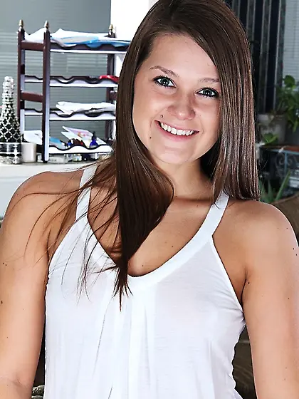 Alluring brunette peels white