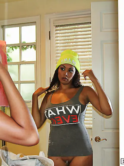 Cute black Serena Ali shows off her tight pussy in her bedroom