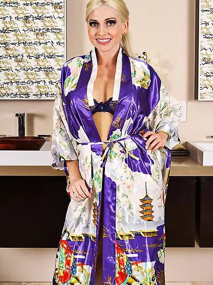 Busty blonde Christie Stevens pulls out all the stops for a stri