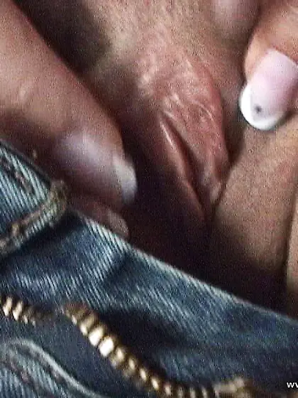 Betty Saint takes her tight blue jeans off and then showers her